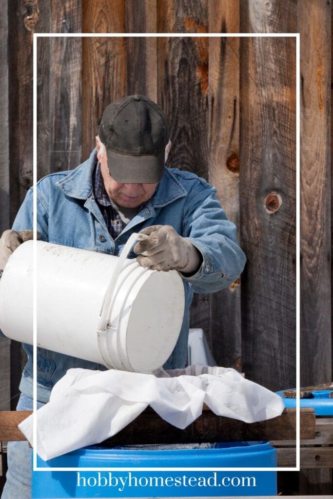 Pouring Maple Sap Through Strainer